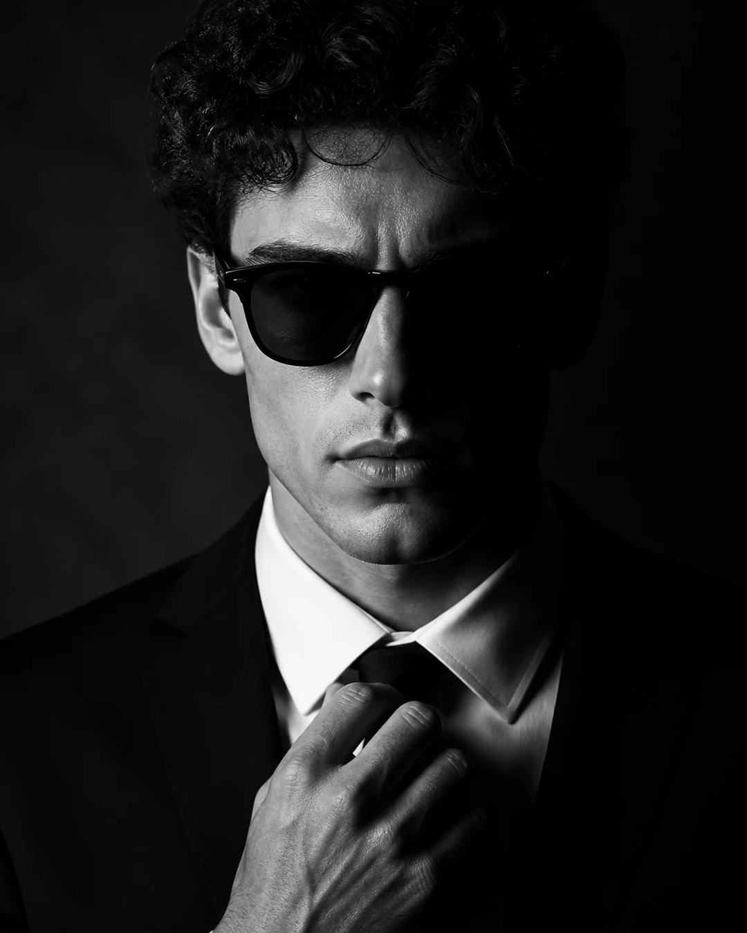 Monochrome Black Suit Chiaroscuro Portrait Prompt, image 2