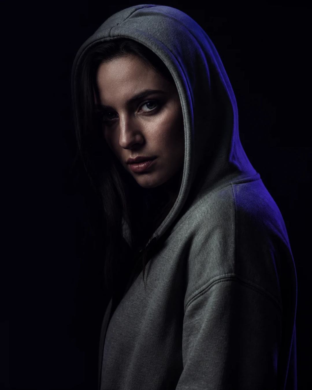 Dark Cinematic Gray Hoodie Editorial Portrait Prompt, image 3