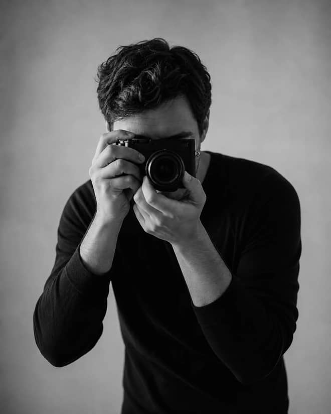 Cinematic Black and White Photographer Portrait Prompt