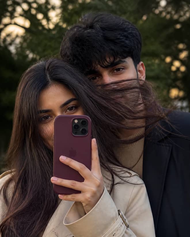 Candid Phone-Obscured Couple Selfie Photo Prompt